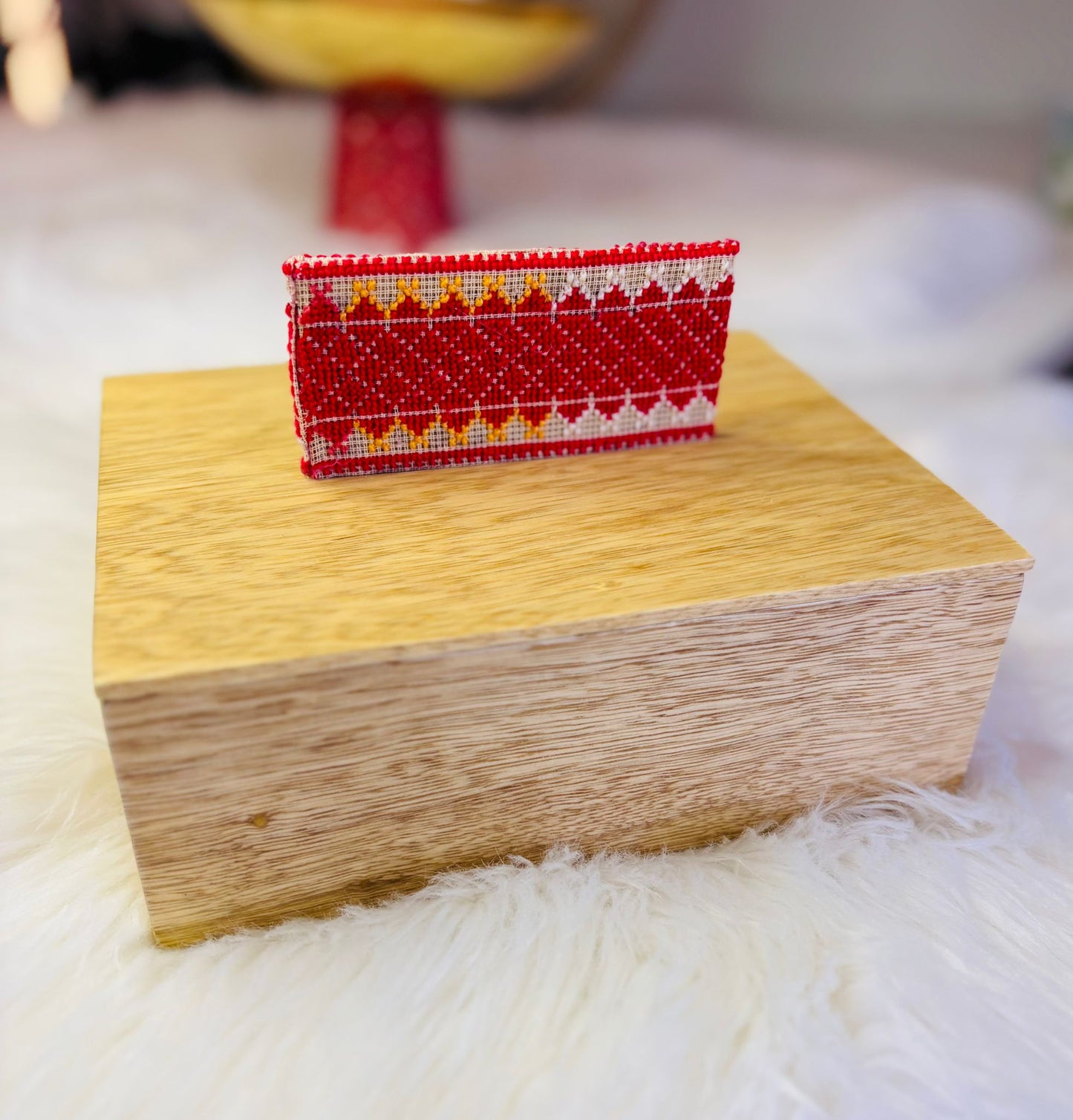 Wooden Box with Embroidered Vertical Handle.