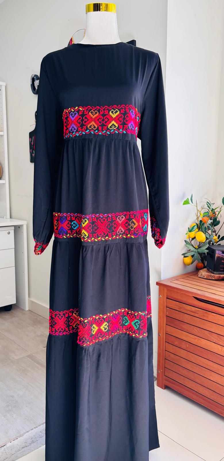 Elegant free size hand embroidered dress.