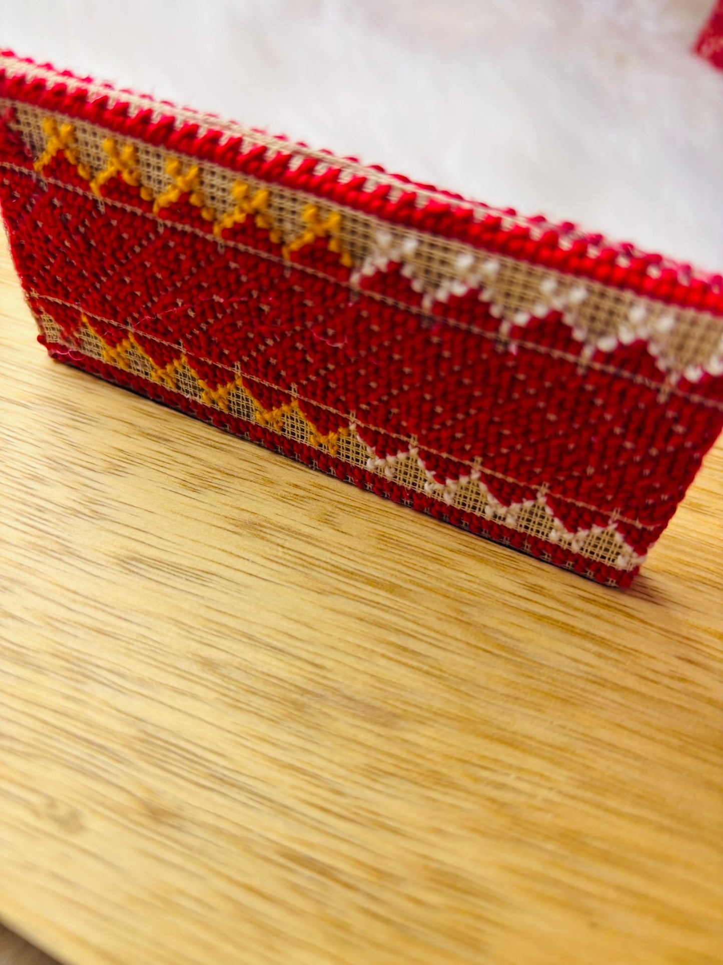 Wooden Box with Embroidered Vertical Handle.