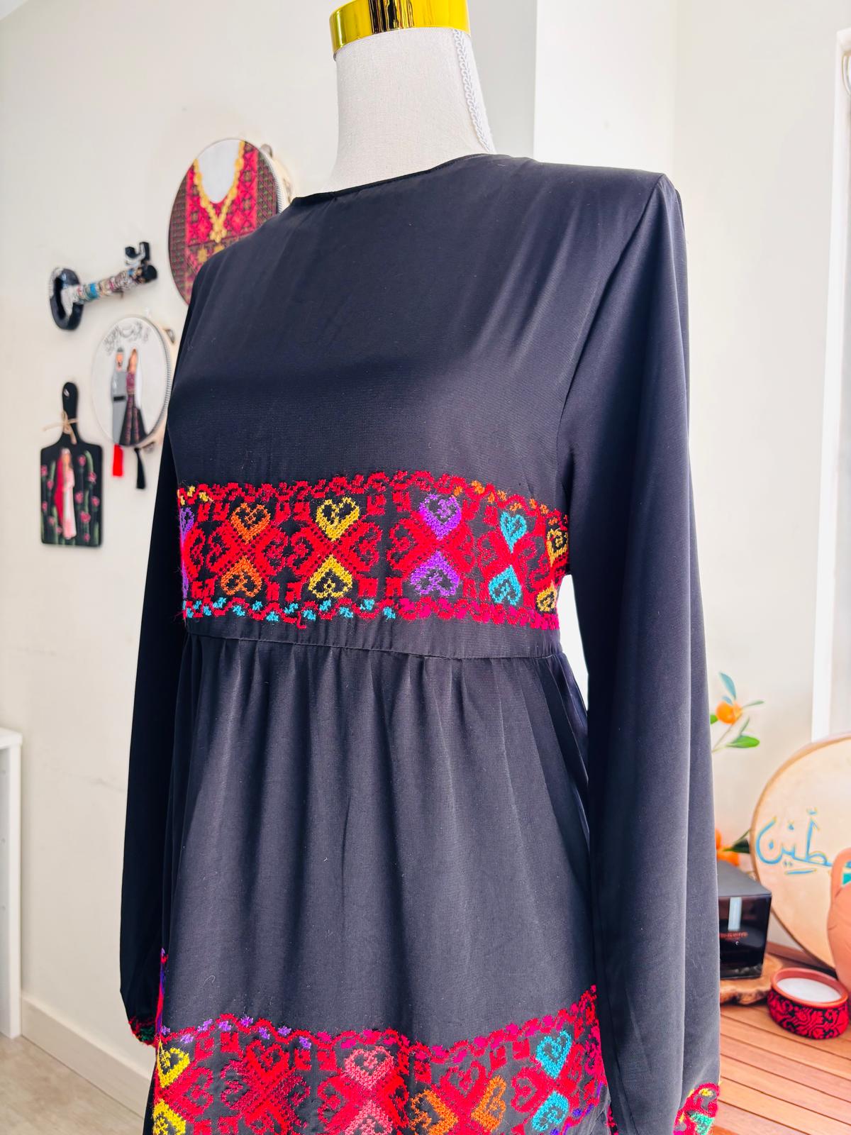 Elegant free size hand embroidered dress.